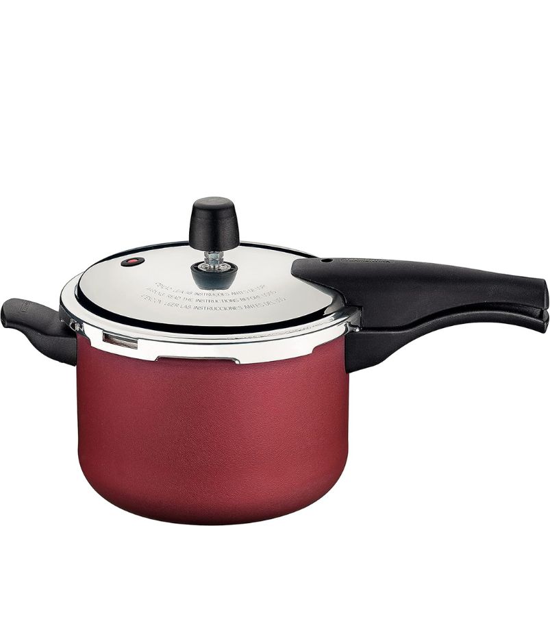 panela-tramontina-vancouver Imagem de uma Panela de Pressão Tramontina Vancouver na cor vinho/bordô. A panela é de alumínio com revestimento interno e externo antiaderente Starflon, e possui alças e cabo pretos, destacando segurança e design moderno.