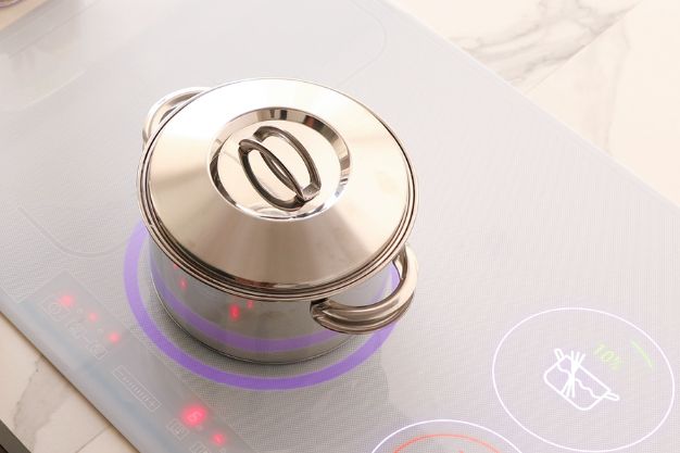 Fogão por indução com comando tátil (touch control) no painel de vidro