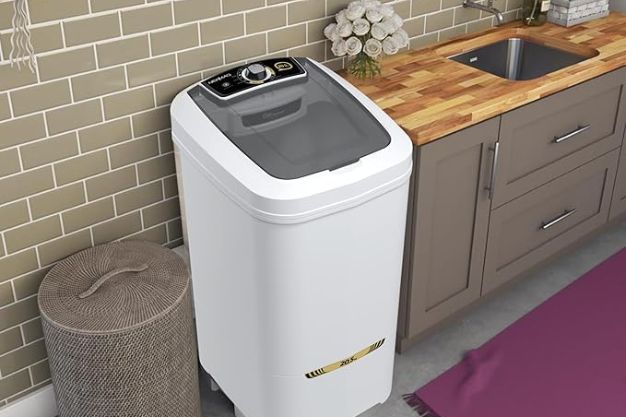 Tanquinho Newmaq 20kg instalado na lavanderia